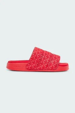 ADILETTE ESSENTIAL - Claquettes | Rouge